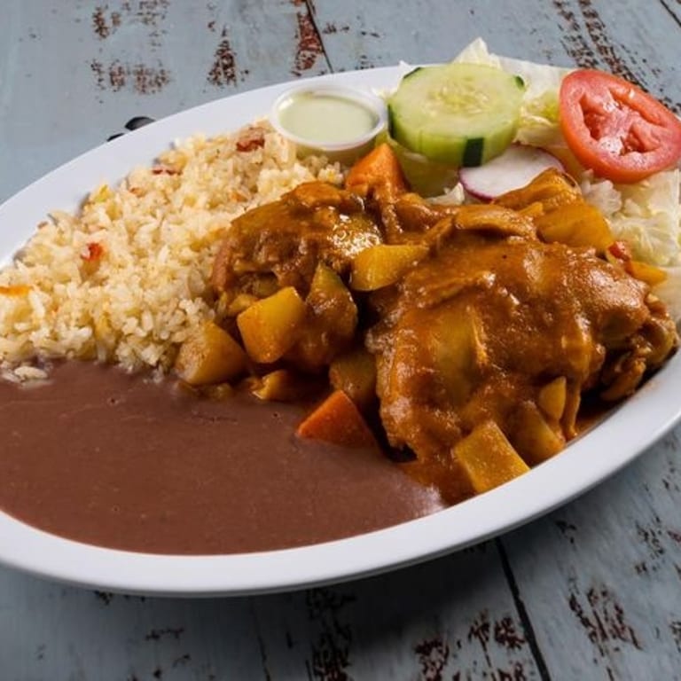 Delicious Pollo Guisado Awaits